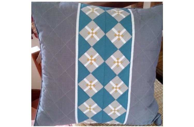 Seminole patchwork cushion by Karen Stringer